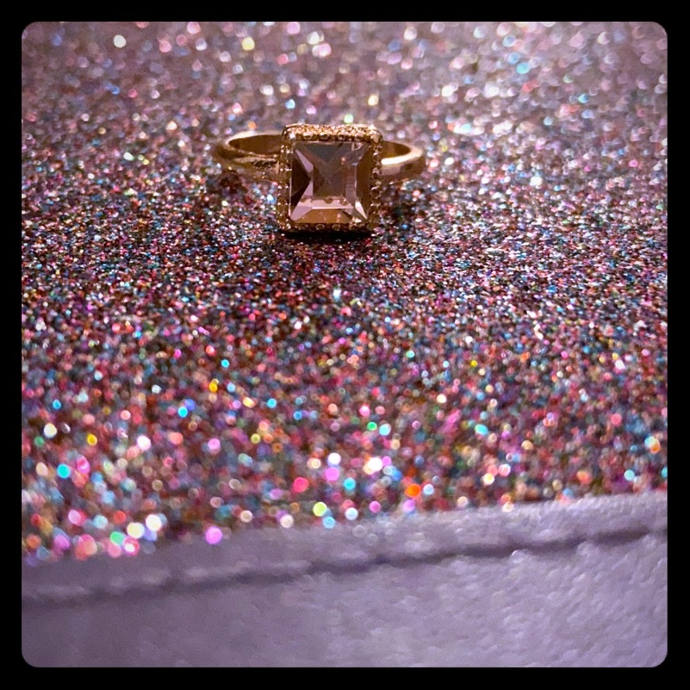 Rose gold and rose quartz stone ring.